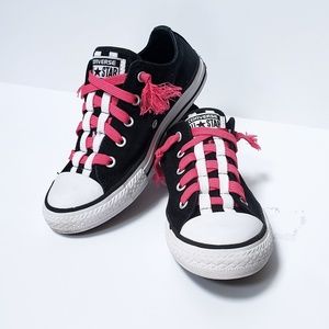 Pink and black converse